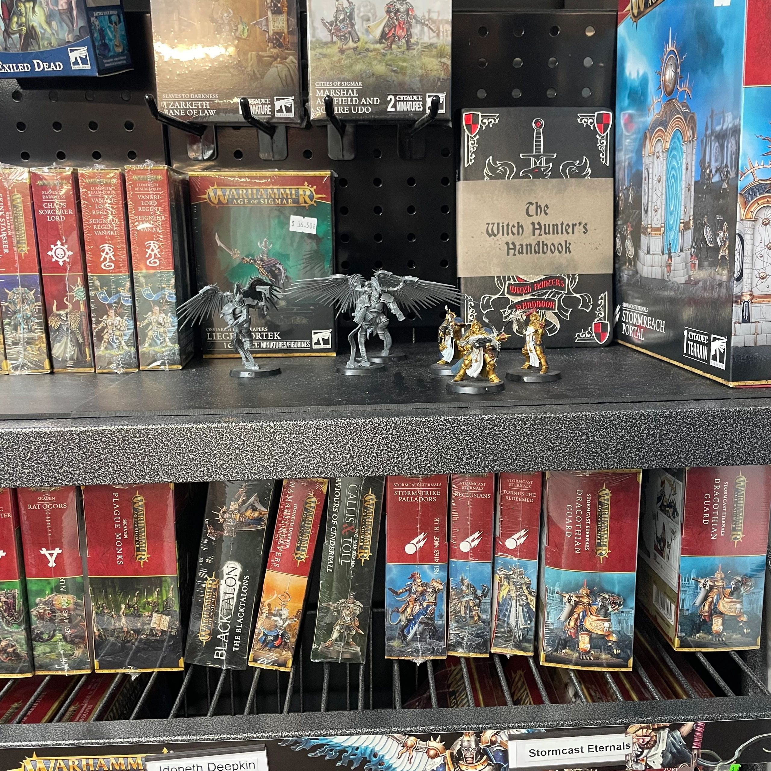 Age of Sigmar game boxes and accessories