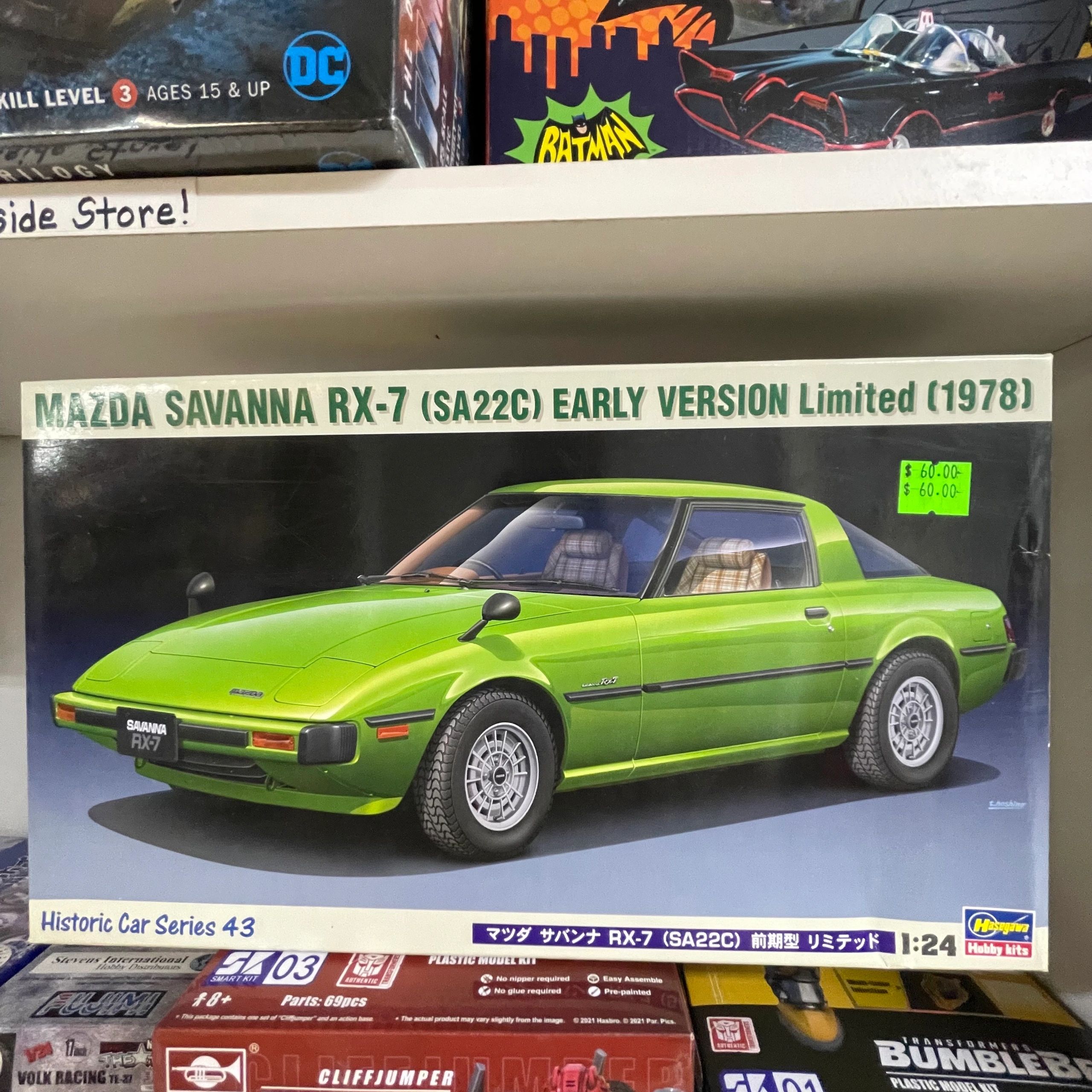 Model kit box of a green 1978 Mazda Savanna RX-7 (SA22C) early version