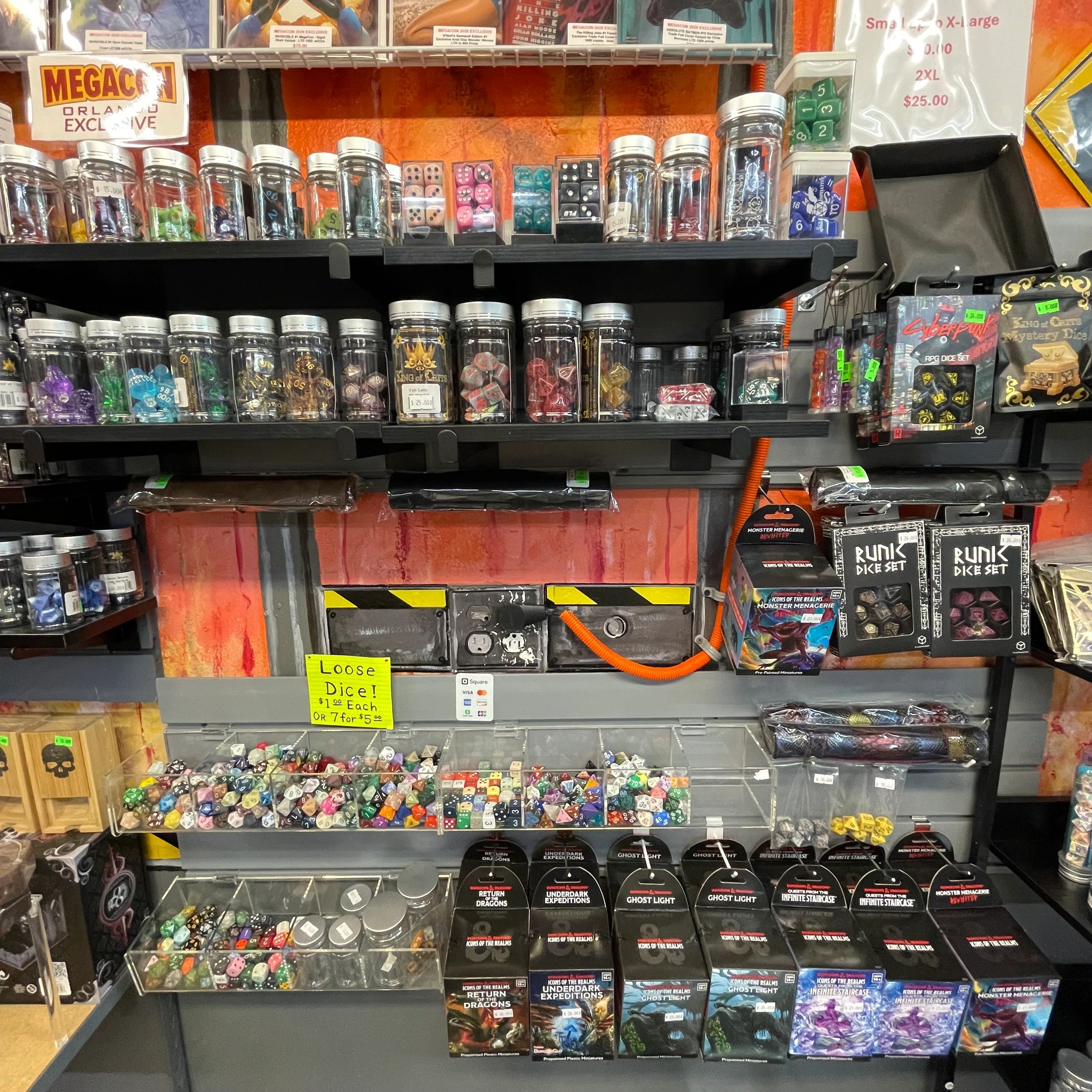 Gaming dice collection on shelves